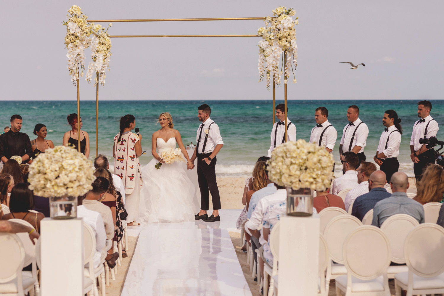 Beautiful beach wedding ceremony at iberostar paraiso beach resort